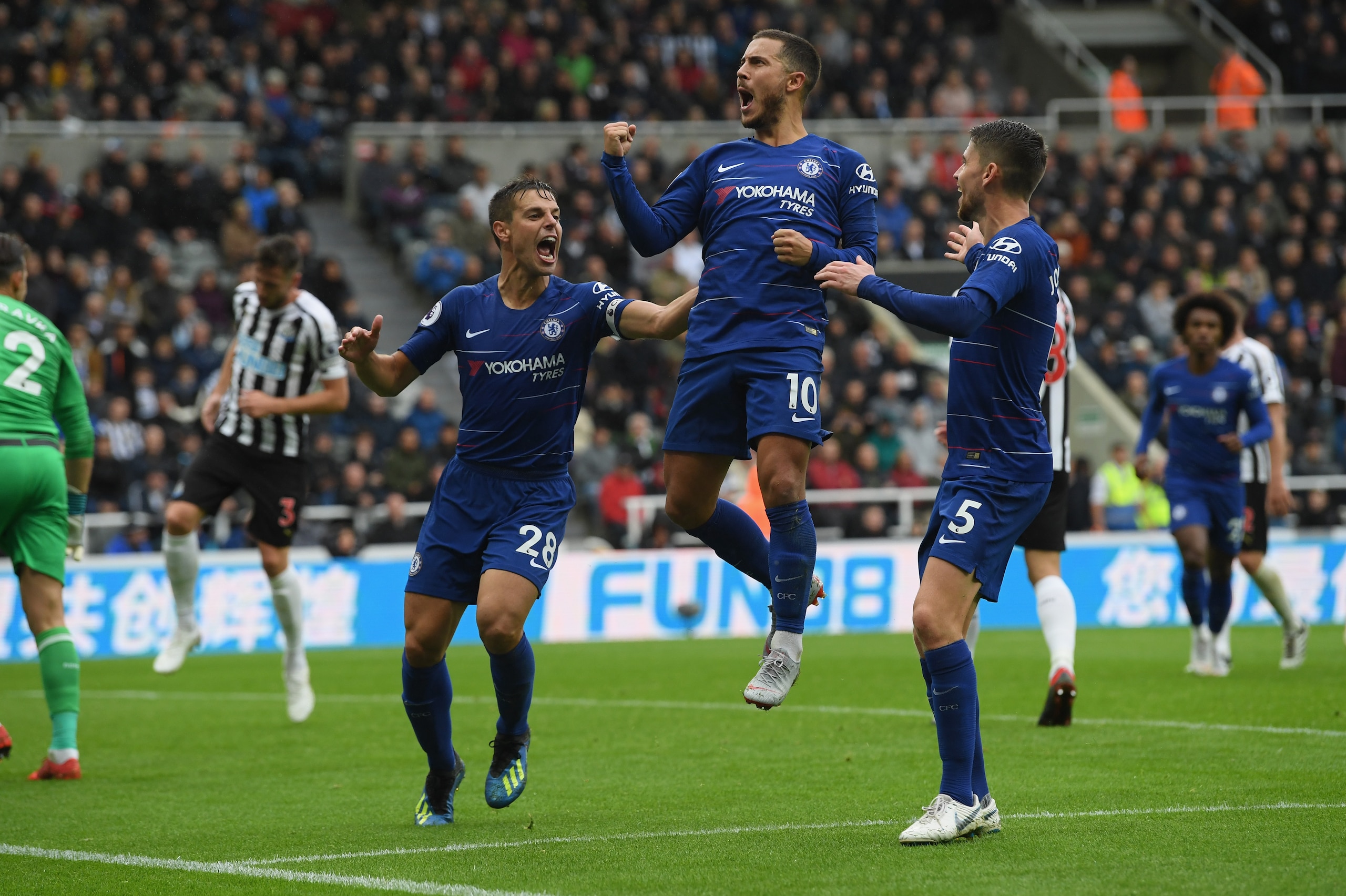 NEWCASTLE UPON TYNE, ENGLAND - AUGUST 26:  Chelsea player Eden Hazard (c) ceebrates after scoring the first chelsea goal during the Premier League match between Newcastle United and Chelsea FC at St. James Park on August 26, 2018 in Newcastle upon Tyne, United Kingdom.  (Photo by Stu Forster/Getty Images)