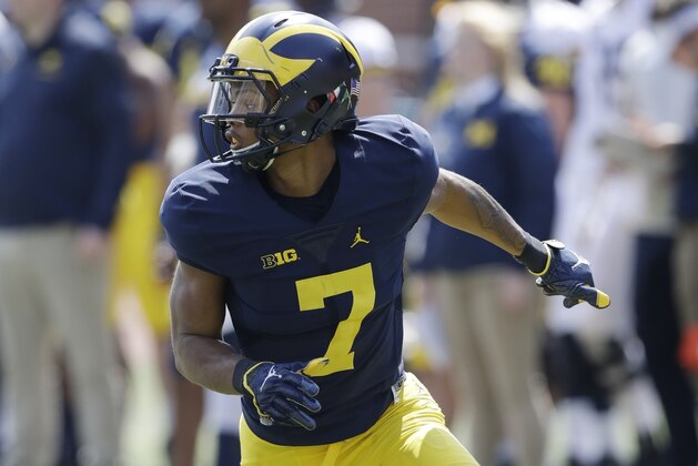Michigan receiver Tarik Black runs a pattern during the Michigan spring football game, Saturday, April 15, 2017, in Ann Arbor, Mich. (AP Photo/Carlos Osorio)