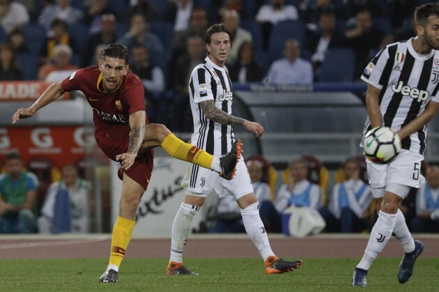 Roma's Lorenzo Pellegrini fires a shot during a Serie A soccer match between Roma and Juventus, at the Rome Olympic stadium, Sunday, May 13, 2018. (AP Photo/Gregorio Borgia)