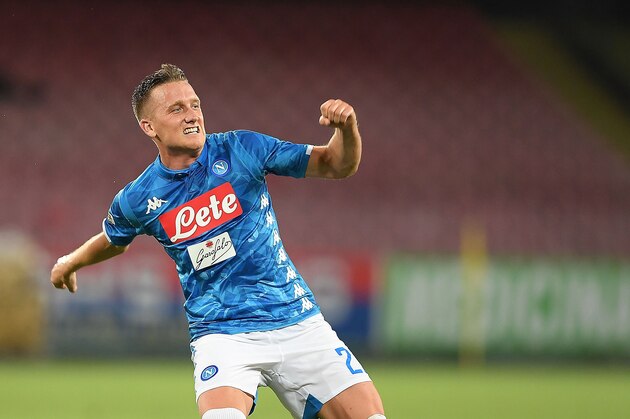 NAPLES, ITALY - AUGUST 25:  Piotr Zielinski of SSC Napoli celebrates after scoring the 2-2 goal during the serie A match between SSC Napoli and AC Milan at Stadio San Paolo on August 25, 2018 in Naples, Italy.  (Photo by Francesco Pecoraro/Getty Images)