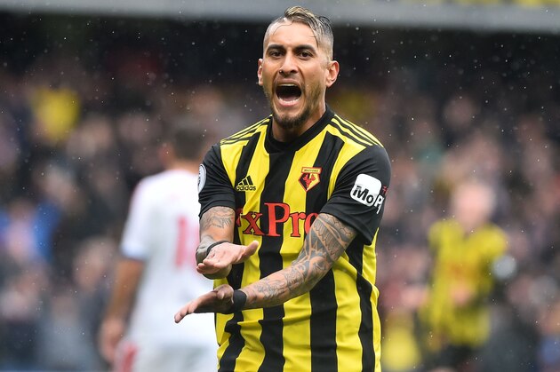 Watford's Argentinian midfielder Roberto Pereyra celebrates scoring the team's first goal during the English Premier League football match between Watford and Crystal Palace at Vicarage Road Stadium in Watford, north of London on August 26, 2018. (Photo by Glyn KIRK / AFP) / RESTRICTED TO EDITORIAL USE. No use with unauthorized audio, video, data, fixture lists, club/league logos or 'live' services. Online in-match use limited to 120 images. An additional 40 images may be used in extra time. No video emulation. Social media in-match use limited to 120 images. An additional 40 images may be used in extra time. No use in betting publications, games or single club/league/player publications. /         (Photo credit should read GLYN KIRK/AFP/Getty Images)
