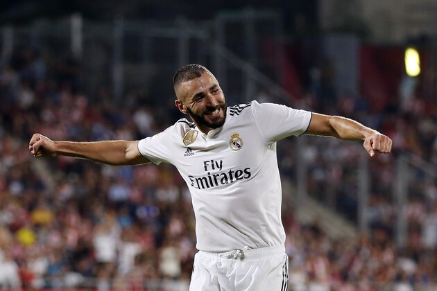 Real Madrid's French forward Karim Benzema celebrates his second goal during the Spanish league football match between Girona FC and Real Madrid CF at the Montilivi stadium in Girona on August 26, 2018. (Photo by Pau BARRENA CAPILLA / AFP)        (Photo credit should read PAU BARRENA CAPILLA/AFP/Getty Images)