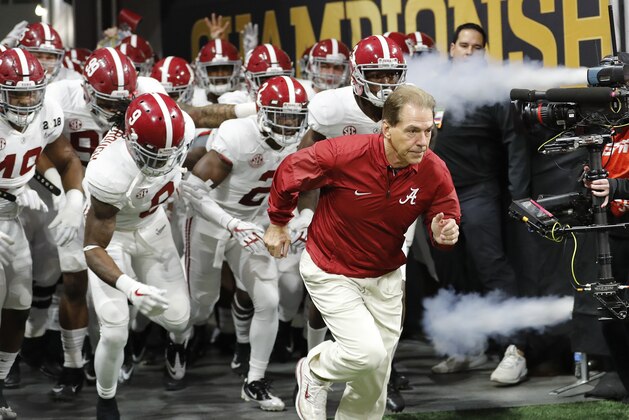 FILE - In this Jan. 8, 2018, file photo, Alabama head coach Nick Saban leads his team on the field before the NCAA college football playoff championship game against Georgia, in Atlanta. The AP preseason Top 25 is out, and for the third straight year Alabama is No. 1. (AP Photo/David Goldman, File)