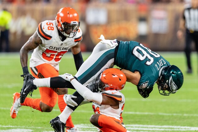 CLEVELAND, OH - AUGUST 23: Denzel Ward #21 of the Cleveland Browns tackles Zach Ertz #86 of the Philadelphia Eagles during the first half of a preseason game at FirstEnergy Stadium on August 23, 2018 in Cleveland, Ohio. (Photo by Jason Miller/Getty Images)