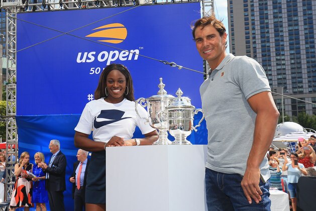 NEW YORK, NY - AUGUST 23:  Rafael Nadal (R) of Spain and Sloane Stephens (L) of the United States smile alongside the US Open men's and women's singles trophies after the US Open Live Draw Unveiling at the US Open Experience at Brookfield Place on August 23, 2018 in New York City.  (Photo by Chris Trotman/Getty Images for USTA)