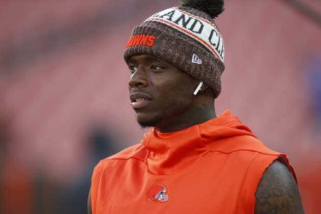 Cleveland Browns wide receiver Josh Gordon watches before an NFL football game between the Browns and the Philadelphia Eagles, Thursday, Aug. 23, 2018, in Cleveland. (AP Photo/Ron Schwane)