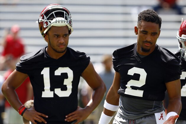 FILE - In this Aug. 4, 2018, file photo, Alabama quarterbacks Jalen Hurts (2) and Tua Tagovailoa (13) runs drills during an NCAA college football practice, in Tuscaloosa, Ala. Alabama enters game week with no answer, publicly at least, to the question of who will start at quarterback against Louisville. (AP Photo/Butch Dill, File)