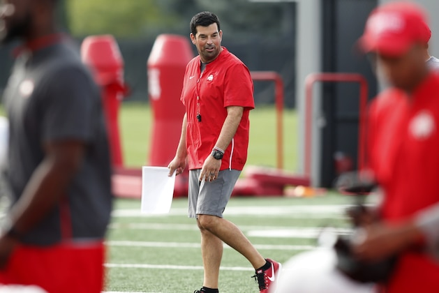 Acting Ohio State University football coach Ryan Day, center, is seen during NCAA college football practice in Columbus, Ohio, Saturday, Aug. 18, 2018. (AP Photo/Paul Vernon)
