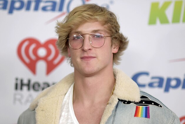 FILE - In this Dec. 1, 2017, file photo, YouTube personality Logan Paul arrives at Jingle Ball in Inglewood, Calif. YouTube sensations KSI and Paul are taking their acts into the boxing ring. They’ve agreed to a two-fight deal, with the first bout in the Manchester, England, on Aug. 25, 2018, and a rematch in the United States. (Photo by Richard Shotwell/Invision/AP, File)