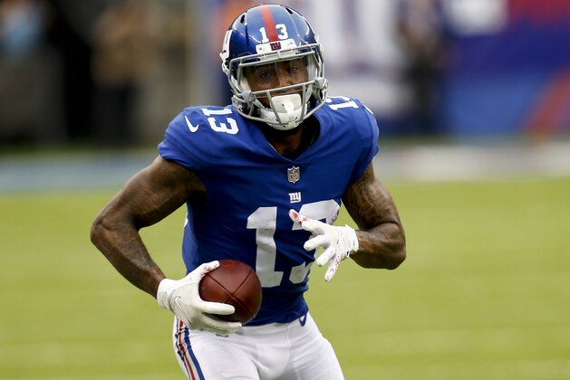 EAST RUTHERFORD, NJ - OCTOBER 08:  Odell Beckham #13 of the New York Giants runs in for a touchdown  during their game against Los Angeles Chargers at MetLife Stadium on October 8, 2017 in East Rutherford, New Jersey. (Photo by Jeff Zelevansky/Getty Images)
