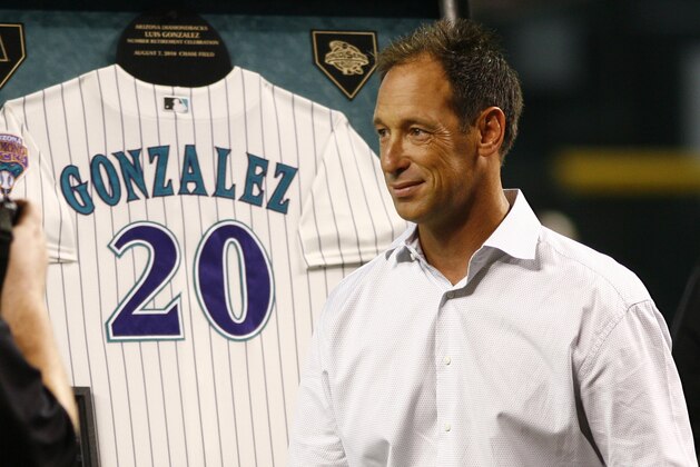 Luis Gonzalez gets his number twenty retired by the Arizona Diamondbacks before a game against the San Diego Padres on Saturday, Aug. 7, 2010, in Phoenix. (AP Photo/Rick Scuteri)