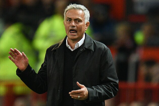 Manchester United's Portuguese manager Jose Mourinho gestures from the touchline during the English Premier League football match between Manchester United and Tottenham Hotspur at Old Trafford in Manchester, north west England, on August 27, 2018. (Photo by Oli SCARFF / AFP) / RESTRICTED TO EDITORIAL USE. No use with unauthorized audio, video, data, fixture lists, club/league logos or 'live' services. Online in-match use limited to 120 images. An additional 40 images may be used in extra time. No video emulation. Social media in-match use limited to 120 images. An additional 40 images may be used in extra time. No use in betting publications, games or single club/league/player publications. /         (Photo credit should read OLI SCARFF/AFP/Getty Images)