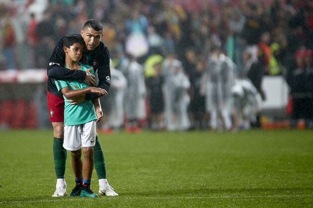 LISBOA, PORTUGAL - JUNE 07:  Cristiano Ronaldo of Portugal plays with his son after the friendly match of preparation for FIFA 2018 World Cup between Portugal and Algeria at the Estadio do Sport Lisboa e Benfica on June 7, 2018 in Lisboa, Portugal.  (Photo by Quality Sport Images/Getty Images)