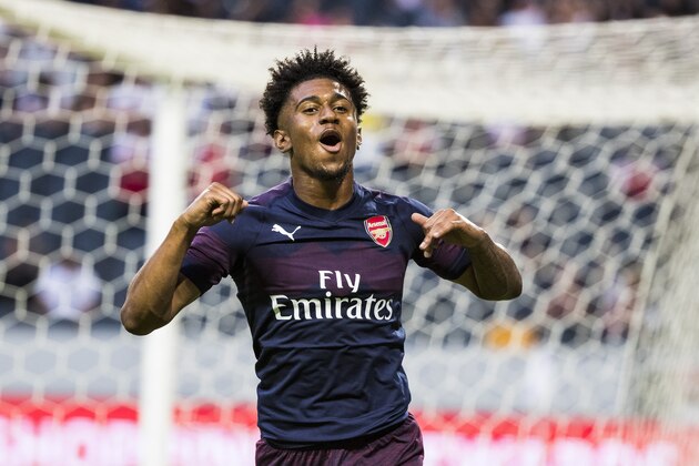 STOCKHOLM, SWEDEN - AUGUST 04: Reiss Nelson of Arsenal FC celebrates scoring the 1-0 goal during the Pre-season friendly between Arsenal and SS Lazio at Friends Arena on August 4, 2018 in Stockholm, Sweden. (Photo by MICHAEL CAMPANELLA/Getty Images)