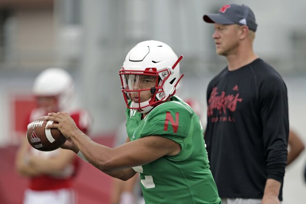 Nebraska quarterback Adrian Martinez (2) performs a drill during NCAA college football fall practice in Lincoln, Neb., Wednesday, Aug. 8, 2018. (AP Photo/Nati Harnik)