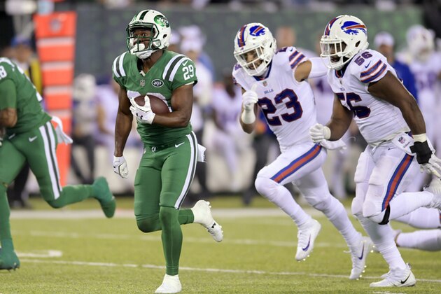 FILE - In this Nov. 2, 2017, file photo, New York Jets running back Bilal Powell, center, runs with the ball as Buffalo Bills strong safety Micah Hyde (23) and defensive end Ryan Davis (56) chase him during the second half of an NFL football game, in East Rutherford, N.J. Winning in daily fantasy isn't always about finding contrarian picks. Yes, you want to differentiate your lineup to increase your odds at winning in tournaments, but you can't ignore the studs that are still worth their high price tags. (AP Photo/Bill Kostroun, File)