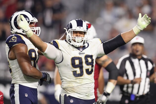 GLENDALE, AZ - DECEMBER 03:  Defensive end Aaron Donald #99 of the Los Angeles Rams reacts after a tackle against the Arizona Cardinals during the second half of the NFL game at the University of Phoenix Stadium on December 3, 2017 in Glendale, Arizona.  The Rams defeated the Cardinals 32-16.  (Photo by Christian Petersen/Getty Images)