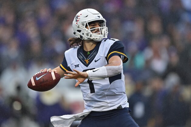 MANHATTAN, KS - NOVEMBER 11:  Quarterback Will Grier #7 of the West Virginia Mountaineers throws a pass against the Kansas State Wildcats during the first half on November 11, 2017 at Bill Snyder Family Stadium in Manhattan, Kansas.  (Photo by Peter G. Aiken/Getty Images)