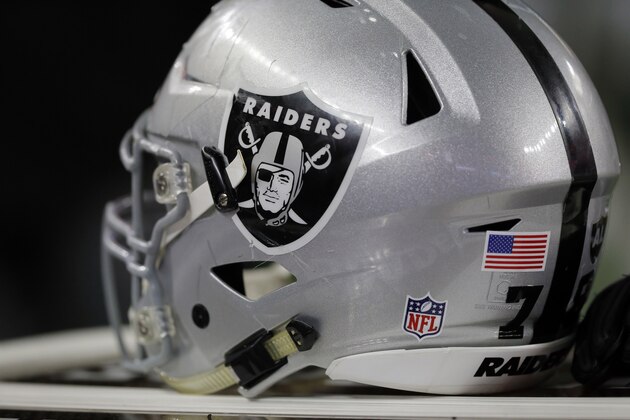 A Oakland Raiders helmet is seen on the sideline during a preseason NFL football game against the Dallas Cowboys on Saturday, Aug. 26, 2017, in Arlington, Texas. (AP Photo/Sarah Warnock)