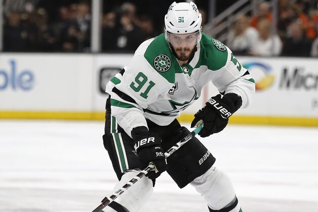 Dallas Stars center Tyler Seguin controls the puck against the Anaheim Ducks during the first period of an NHL hockey game in Anaheim, Calif., Wednesday, Feb. 21, 2018. (AP Photo/Alex Gallardo)