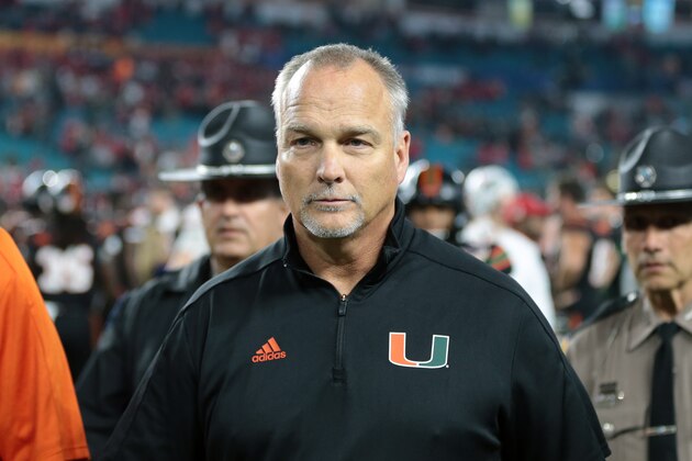 MIAMI GARDENS, FL - DECEMBER 30: Head coach Mark Richt of the Miami Hurricanes walks off the field after the loss to the Wisconsin Badgers during the 2017 Capital One Orange Bowl at Hard Rock Stadium on December 30, 2017 in Miami Gardens, Florida. Wisconsin defeated Miami 34-24. (Photo by Joel Auerbach/Getty Images)