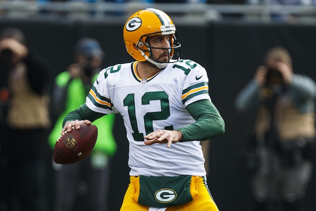 Green Bay Packers quarterback Aaron Rodgers (12) looks to throw the ball against the Carolina Panthers during an NFL game in Charlotte, N.C. on Sunday, Dec. 17, 2017. (Chris Keane/AP Images for Panini)