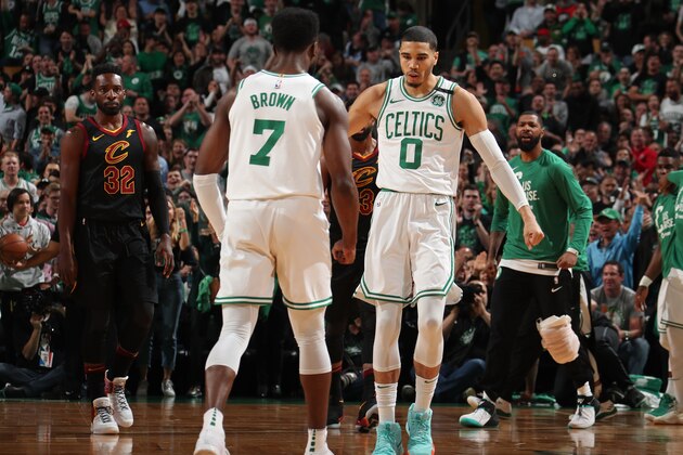 BOSTON, MA - MAY 27:  Jaylen Brown #7 and Jayson Tatum #0 of the Boston Celtics exchange a handshake during Game Seven of the Eastern Conference Finals of the 2018 NBA Playoffs against the Cleveland Cavaliers on May 27, 2018 at the TD Garden in Boston, Massachusetts. NOTE TO USER: User expressly acknowledges and agrees that, by downloading and or using this photograph, User is consenting to the terms and conditions of the Getty Images License Agreement. Mandatory Copyright Notice: Copyright 2018 NBAE (Photo by Nathaniel S. Butler/NBAE via Getty Images)