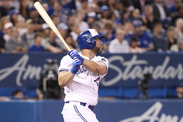 TORONTO, ON - AUGUST 21: Kendrys Morales #8 of the Toronto Blue Jays hits a solo home run in the fifth inning during MLB game action against the Baltimore Orioles at Rogers Centre on August 21, 2018 in Toronto, Canada. (Photo by Tom Szczerbowski/Getty Images)