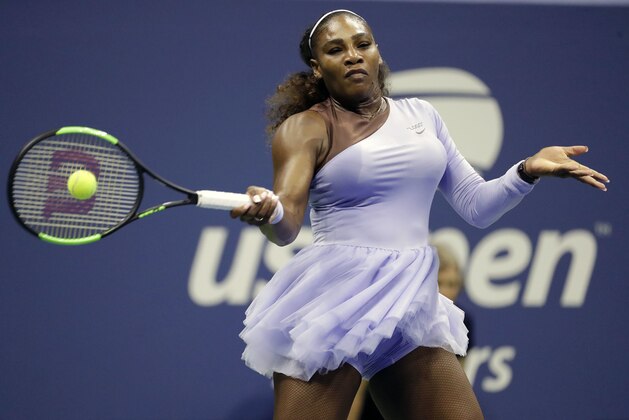 Serena Williams returns a shot to Carina Witthoeft, of Germany, during the second round of the U.S. Open tennis tournament, Wednesday, Aug. 29, 2018, in New York. (AP Photo/Julio Cortez)