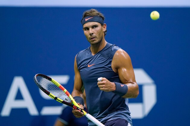 Spain's Rafael Nadal celebrates a point against Canada's Vasek Pospisil during their men's singles tennis match on day 3 of the 2018 US Open at USTA Billie Jean King National Tennis Center in New York on August 29, 2018. (Photo by EDUARDO MUNOZ ALVAREZ / AFP)        (Photo credit should read EDUARDO MUNOZ ALVAREZ/AFP/Getty Images)