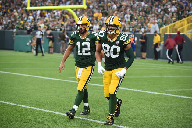GREEN BAY, WI - AUGUST 16:  Aaron Rodgers #12 and Jimmy Graham #80 of the Green Bay Packers walk off the field following a touchdown against the Pittsburgh Steelers during a preseason game at Lambeau Field on August 16, 2018 in Green Bay, Wisconsin.  The Packers defeated the Steelers 51-34.  (Photo by Stacy Revere/Getty Images)