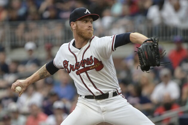 Atlanta Braves' Mike Foltynewicz pitches against the Colorado Rockies during the first inning of a baseball game Saturday, Aug. 18, 2018, in Atlanta. (AP Photo/John Amis)