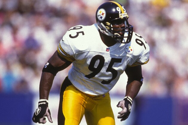BALTIMORE, MD - OCTOBER 6:  Greg Lloyd #95 of the Pittsburgh Steelers gets into postion during a NFL football game against the Pittsburgh Steelers on October 6, 1997 at memorail Stadium in Baltimore, Maryland.   (Photo by Mitchell Layton/Getty Images)