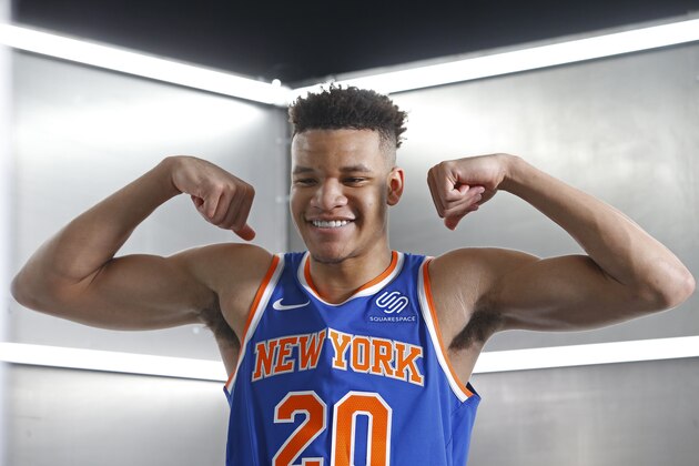 TARRYTOWN, NY - AUGUST 12: Kevin Knox #20 of the New York Knicks flexes during the 2018 NBA Rookie Shoot on August 12, 2018 at the Madison Square Garden Training Center in Tarrytown, New York. NOTE TO USER: User expressly acknowledges and agrees that, by downloading and/or using this Photograph, user is consenting to the terms and conditions of the Getty Images License Agreement. Mandatory Copyright Notice: Copyright 2018 NBAE (Photo by Michelle Farsi/NBAE via Getty Images)