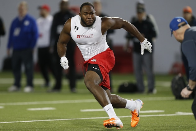 Defensive lineman Tyquan Lewis runs a drill during Ohio State's NFL Pro Day Thursday, March 22, 2018, in Columbus, Ohio. (AP Photo/Jay LaPrete)