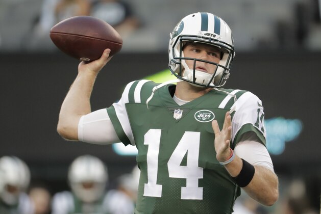 New York Jets quarterback Sam Darnold (14) warms up before an NFL football game against the New York Giants, Friday, Aug. 24, 2018, in East Rutherford, N.J. (AP Photo/Julio Cortez)