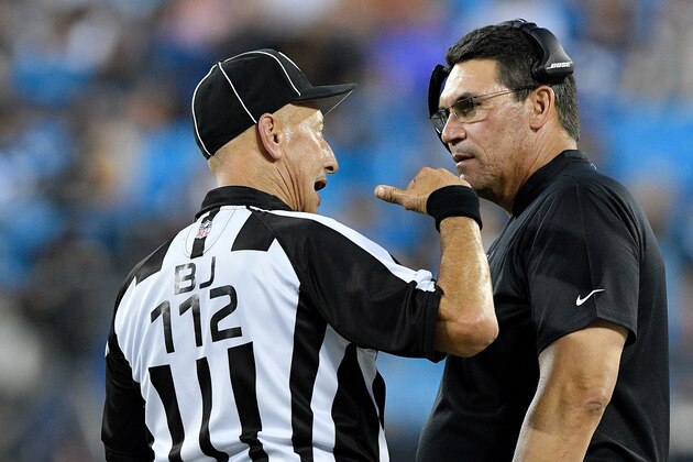 CHARLOTTE, NC - AUGUST 17:  Head coach Ron Rivera of the Carolina Panthers talks to a referee in the second quarter against the Miami Dolphins during the game at Bank of America Stadium on August 17, 2018 in Charlotte, North Carolina.  (Photo by Grant Halverson/Getty Images)
