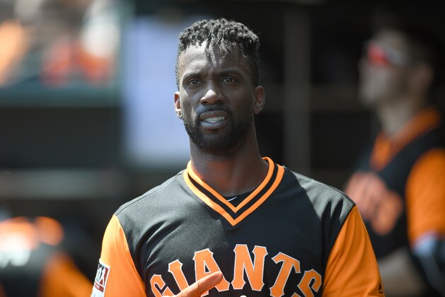 SAN FRANCISCO, CA - AUGUST 25:  Andrew McCutchen #22 of the San Francisco Giants looks on from the dugout after he scored against the Texas Rangers in the bottom of the first inning at AT&T Park on August 25, 2018 in San Francisco, California.  (Photo by Thearon W. Henderson/Getty Images)