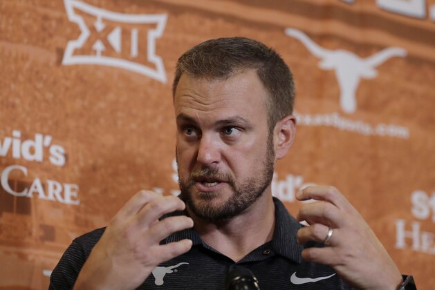 FILE - In this Aug. 2, 2018, file photo, Texas head coach Tom Herman responds to a question during an NCAA college football news conference, in Austin, Texas. Texas broke its string of three consecutive losing seasons in coach Tom Herman’s debut, but came so close to being much better than 7-6. (AP Photo/Eric Gay, File)