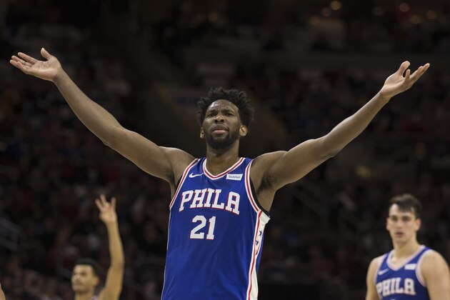 PHILADELPHIA, PA - JANUARY 24: Joel Embiid #21 of the Philadelphia 76ers reacts after making a three point basket along with Timothe Luwawu-Cabarrot #7, and Dario Saric #9 in the third quarter against the Chicago Bulls at the Wells Fargo Center on January 24, 2018 in Philadelphia, Pennsylvania. The 76ers defeated the Bulls 115-101. NOTE TO USER: User expressly acknowledges and agrees that, by downloading and or using this photograph, User is consenting to the terms and conditions of the Getty Images License Agreement. (Photo by Mitchell Leff/Getty Images)