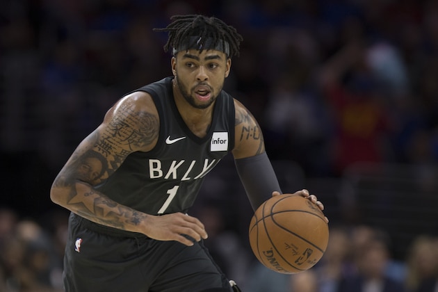 PHILADELPHIA, PA - APRIL 3: D'Angelo Russell #1 of the Brooklyn Nets drives to the basket against the Philadelphia 76ers in the second quarter at the Wells Fargo Center on April 3, 2018 in Philadelphia, Pennsylvania. NOTE TO USER: User expressly acknowledges and agrees that, by downloading and or using this photograph, User is consenting to the terms and conditions of the Getty Images License Agreement. (Photo by Mitchell Leff/Getty Images)
