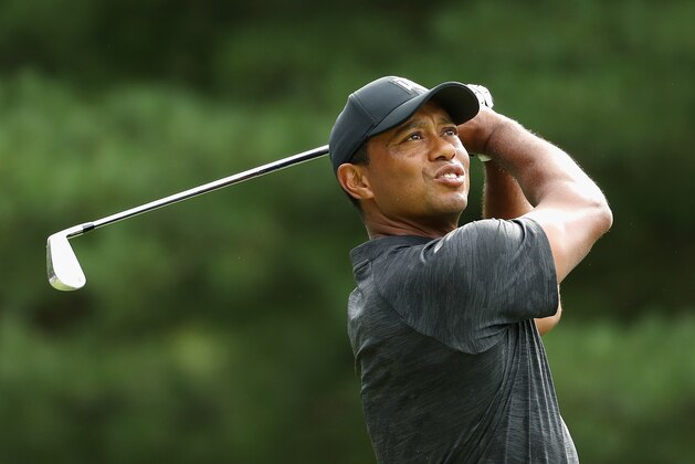 NORTON, MA - AUGUST 31:  Tiger Woods of the United States plays his shot from the 11th tee during the first round of the Dell Technologies Championship at TPC Boston on August 31, 2018 in Norton, Massachusetts.  (Photo by Patrick Smith/Getty Images)