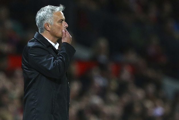 Manchester United manager Jose Mourinho stands on the touchline during the English Premier League soccer match between Manchester United and Tottenham Hotspur at Old Trafford stadium in Manchester, England, Monday, Aug. 27, 2018. (AP Photo/Dave Thompson)