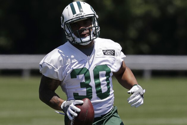 New York Jets running back Thomas Rawls runs during the NFL football team's training camp, Tuesday, June 12, 2018, in Florham Park, N.J. (AP Photo/Mark Lennihan)