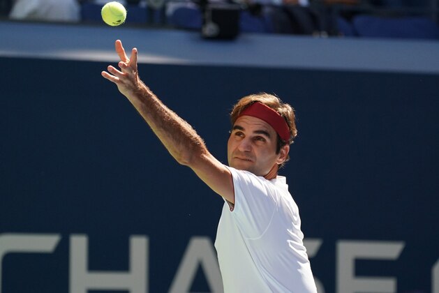 Roger Federer of Switzerland serves to Nick Kyrgios of Australia during Day 6 of the 2018 US Open Men's Singles match at the USTA Billie Jean King National Tennis Center in New York on September 1, 2018. (Photo by TIMOTHY A. CLARY / AFP)        (Photo credit should read TIMOTHY A. CLARY/AFP/Getty Images)