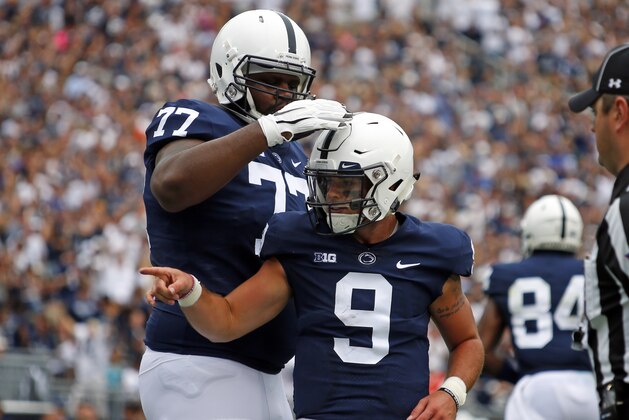 STATE COLLEGE, PA - SEPTEMBER 01:  Trace McSorley #9 of the Penn State Nittany Lions celebrates after rushing for a 12 yard touchdown in the first quarter against the Appalachian State Mountaineers on September 1, 2018 at Beaver Stadium in State College, Pennsylvania.  (Photo by Justin K. Aller/Getty Images)