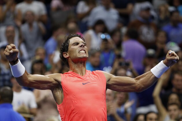 Rafael Nadal, of Spain, celebrates after defeating Karen Khachanov, of Russia, 5-7, 7-5, 7-6 (7), 7-6 (3) during the third round of the U.S. Open tennis tournamen, Friday, Aug. 31, 2018, in New York. (AP Photo/Adam Hunger)