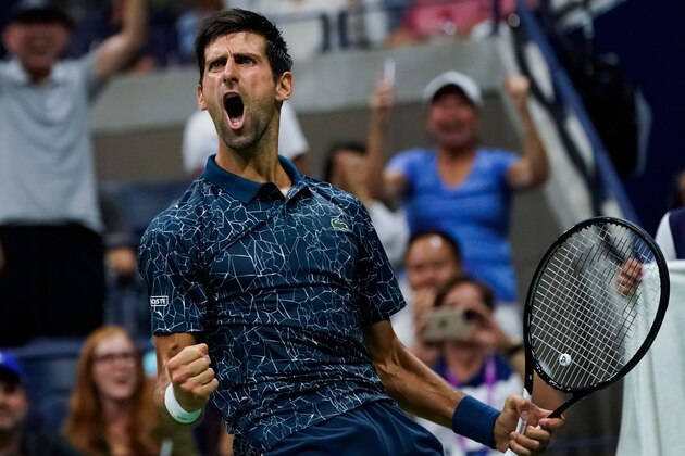 Novak Djokovic of Serbia celebrates a point against Richard Gasquet of France during their 2018 US Open Men's Singles tennis match at the USTA Billie Jean King National Tennis Center in New York on September 1, 2018. (Photo by EDUARDO MUNOZ ALVAREZ / AFP)        (Photo credit should read EDUARDO MUNOZ ALVAREZ/AFP/Getty Images)