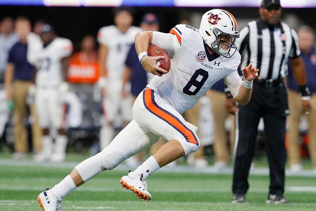 ATLANTA, GA - SEPTEMBER 01:  Jarrett Stidham #8 of the Auburn Tigers rushes against the Washington Huskies at Mercedes-Benz Stadium on September 1, 2018 in Atlanta, Georgia.  (Photo by Kevin C. Cox/Getty Images)