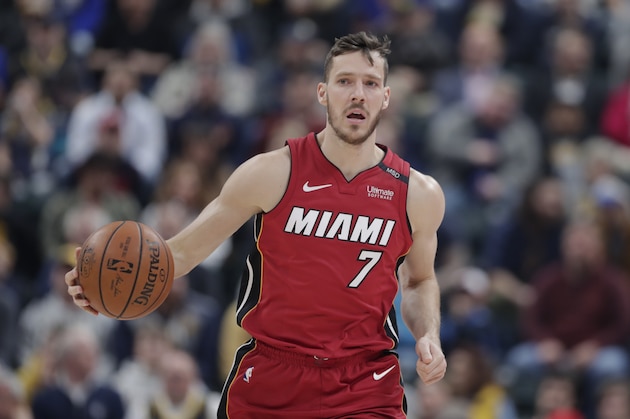 Miami Heat guard Goran Dragic (7) brings the ball up court against the Indiana Pacers during the first half of an NBA basketball game in Indianapolis, Sunday, March 25, 2018. (AP Photo/Michael Conroy)